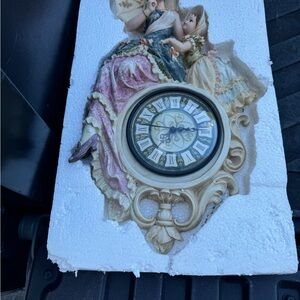 Elegant Vintage Wall Clock with Figurines